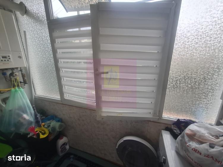 Apartament cu 3 camere semidecomandat în Cuza