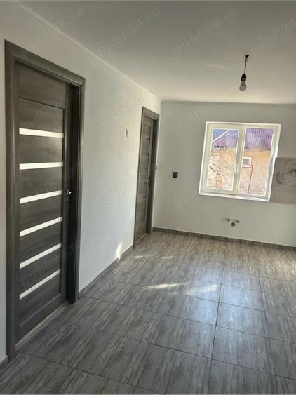 Casă cu Teren 1000 Mp în Ciumărna