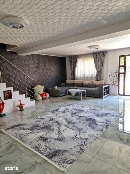 Casă cu 4 camere cu Teren 259 Mp în Comana