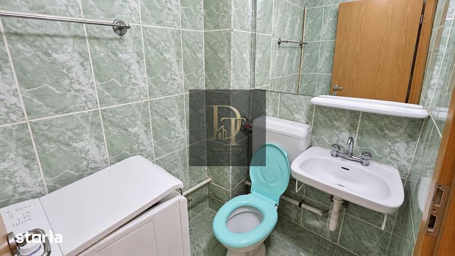 Apartament cu 3 camere decomandat în Tractorul