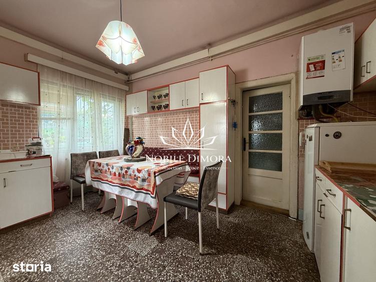 Casă cu 4 camere cu Teren 398 Mp în Central