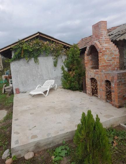 Casă cu 1 camere cu Teren 1000 Mp în Plopșoru