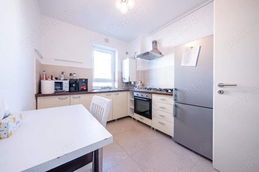 Apartament cu 2 camere decomandat în Tractorul