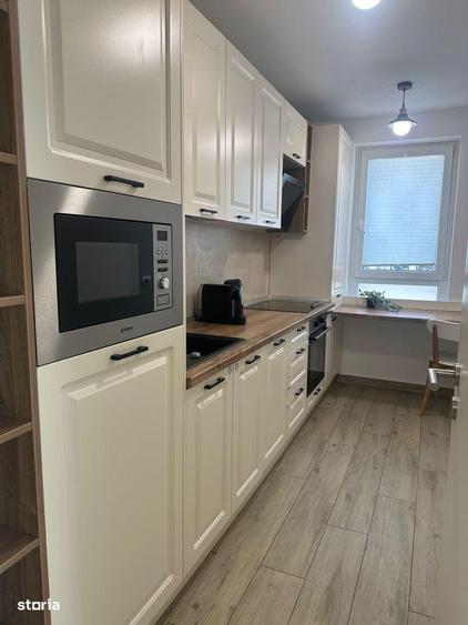 Apartament cu 2 camere, mobilat în Tractorul