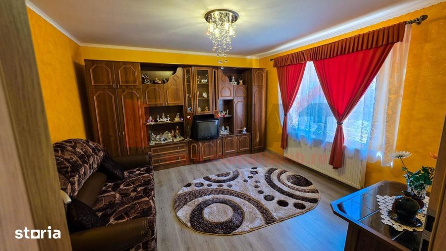 Casă cu 4 camere cu Teren 1456 Mp în Slimnic