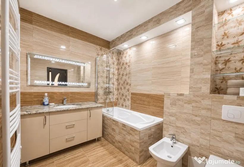 Apartament cu 3 camere decomandat în Tractorul