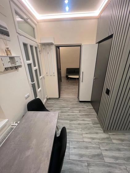 Casă cu Teren 50 Mp în Central