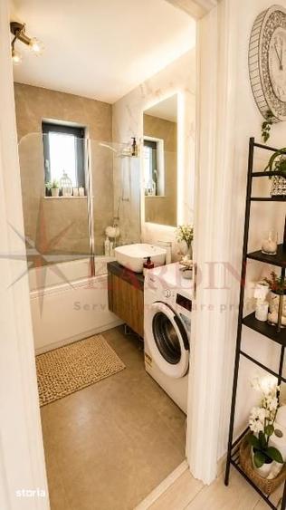 Apartament cu 3 camere decomandat în Tractorul