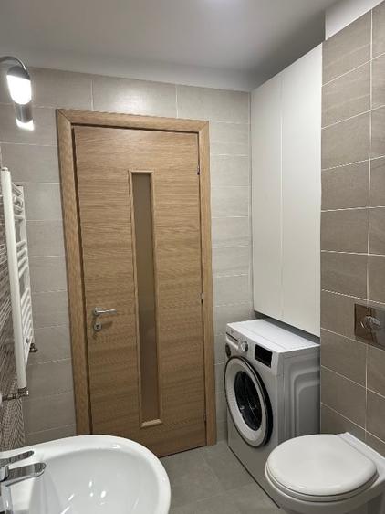 Apartament cu 2 camere decomandat în Tractorul