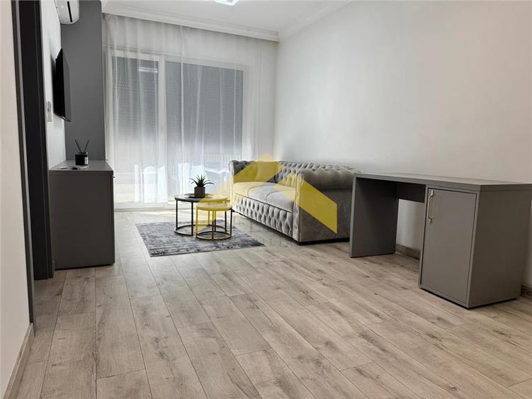 Apartament cu 2 camere semidecomandat, mobilat în UTA