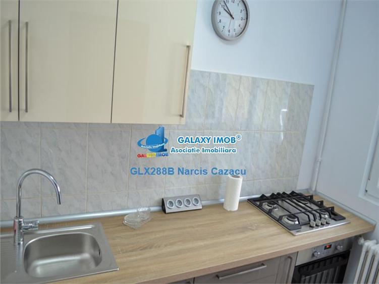 Apartament cu 2 camere semidecomandat, mobilat în Central