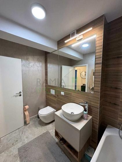 Apartament cu 2 camere decomandat, mobilat în Tractorul