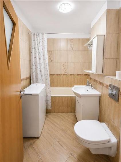 Apartament cu 2 camere decomandat în Tractorul
