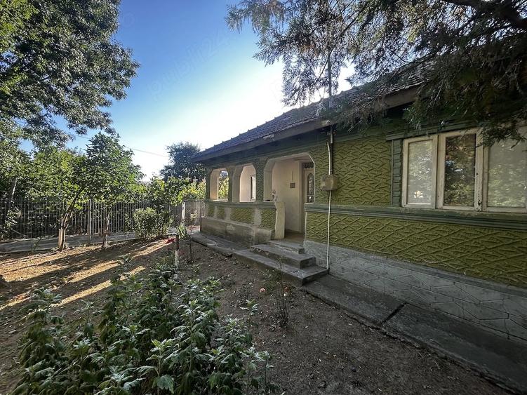 Casă cu 2 camere cu Teren 1250 Mp în Cioceni