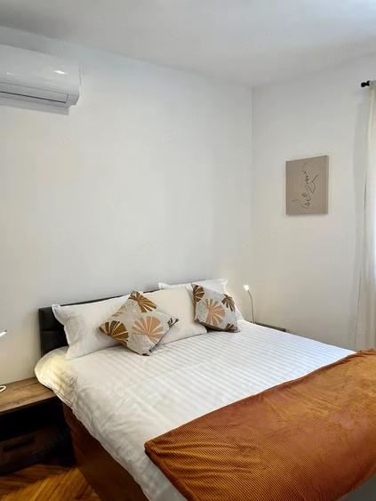 Apartament cu 3 camere decomandat în Titan