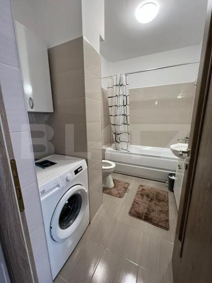 Apartament cu 2 camere semidecomandat, mobilat în Florești