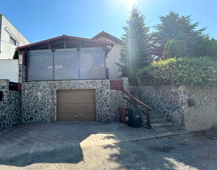 Casă individuală cu 5 camere cu Teren 1500 Mp în Bucium