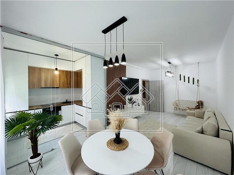 Ap nou, 52 mp utili, balcon - loc de parcare - Zona C. Arhitectilor - - 1