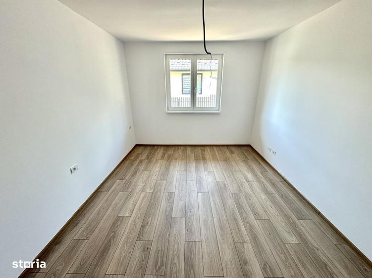 Casă cu 4 camere în Tomești