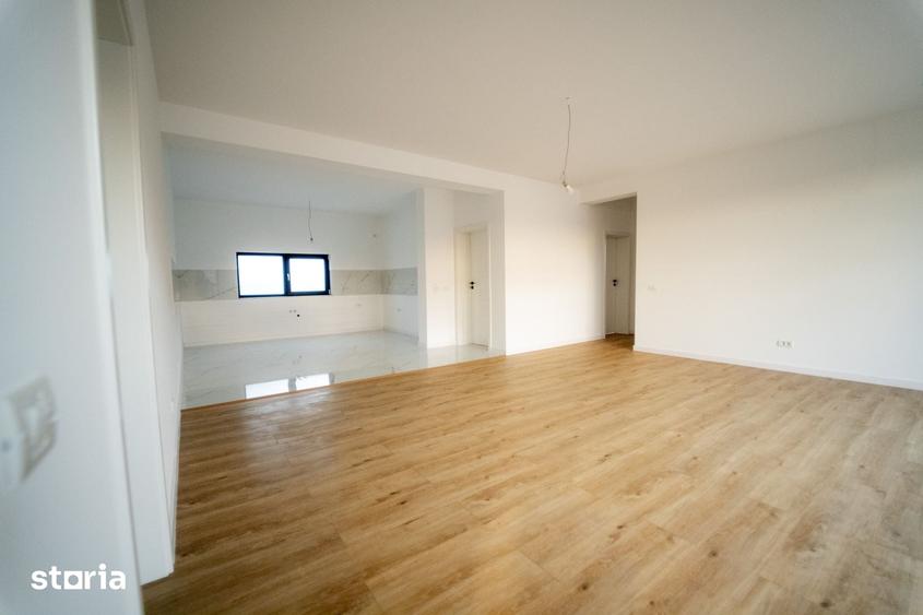 Casă cu 4 camere cu Teren 500 Mp în Bucov