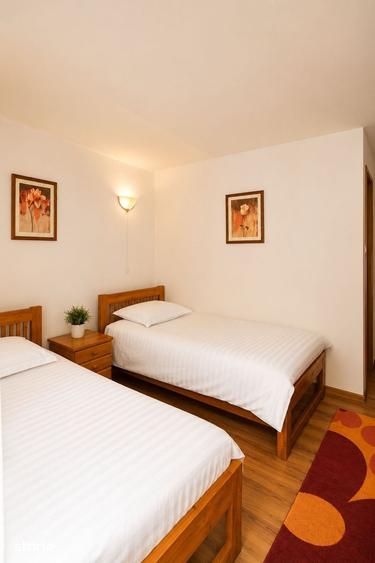 Casă cu 7 camere cu Teren 1000 Mp în Central