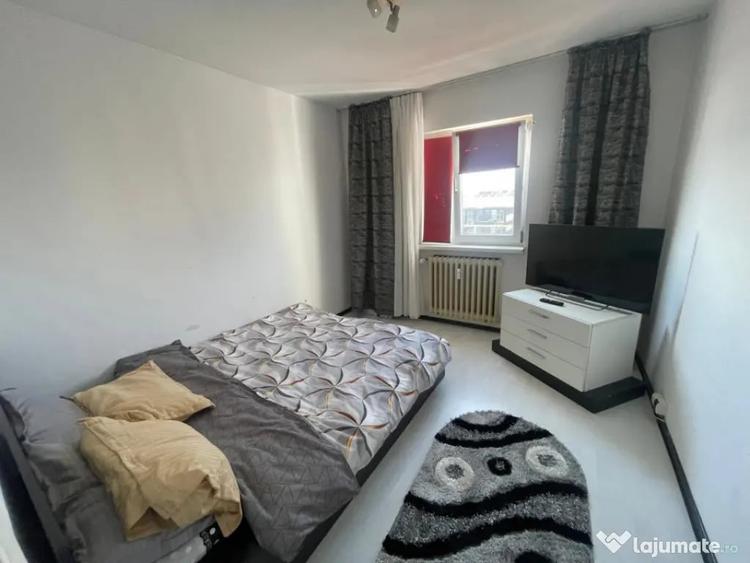 Apartament cu 3 camere semidecomandat, mobilat în Calea București