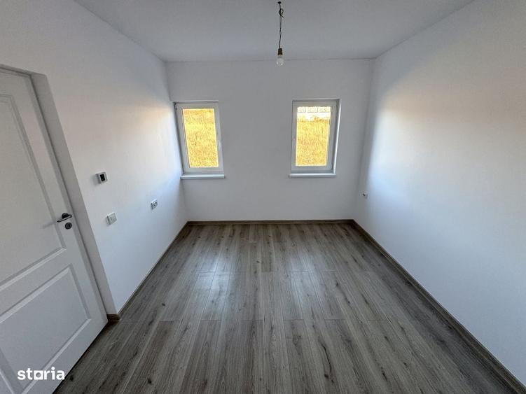 Casă cu 4 camere în Bucium