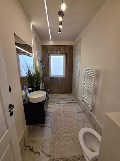 Apartament cu 2 camere semidecomandat, mobilat în Florești