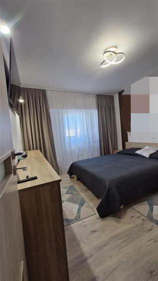 Apartament cu 4 camere semidecomandat, mobilat în Zimbru