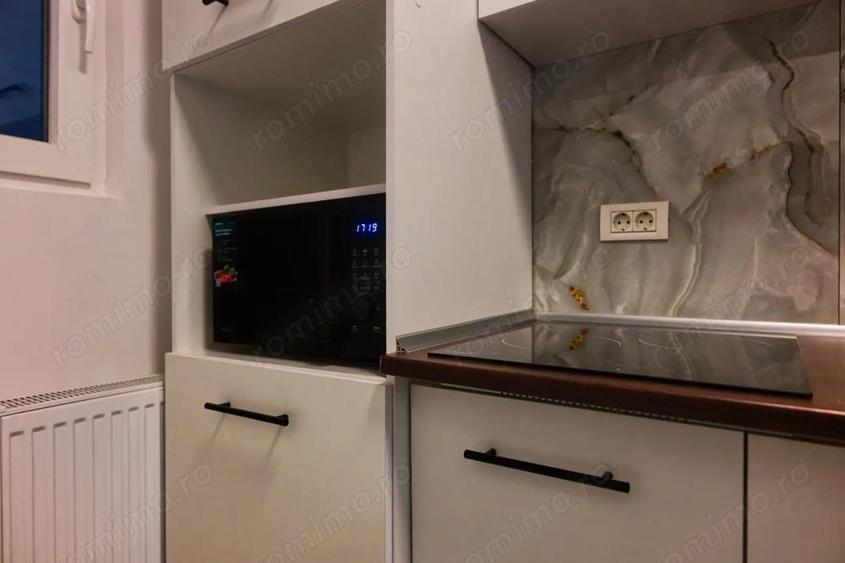 Apartament cu 3 camere semidecomandat în Romană
