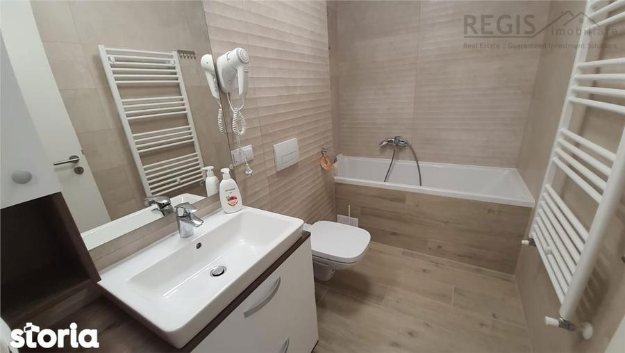 Apartament cu 3 camere decomandat în Tractorul