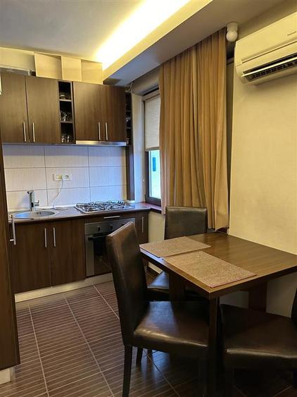 Apartament cu 2 camere decomandat, mobilat în Ultracentral