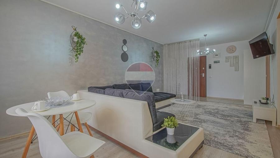 Apartament cu 2 camere semidecomandat, mobilat în Tractorul