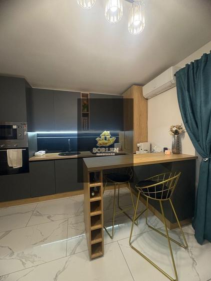 Apartament cu 2 camere semidecomandat, mobilat în Florești