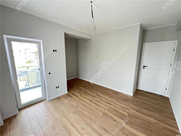 Apartament cu 3 camere decomandat în Șelimbăr — fotografia 3