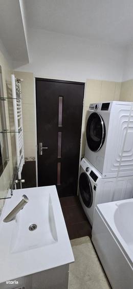 Apartament cu 3 camere decomandat în Km 5