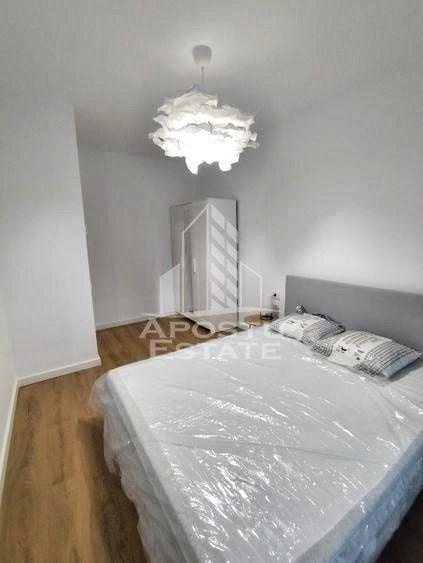 Apartament cu 2 camere semidecomandat, mobilat în Torontalului