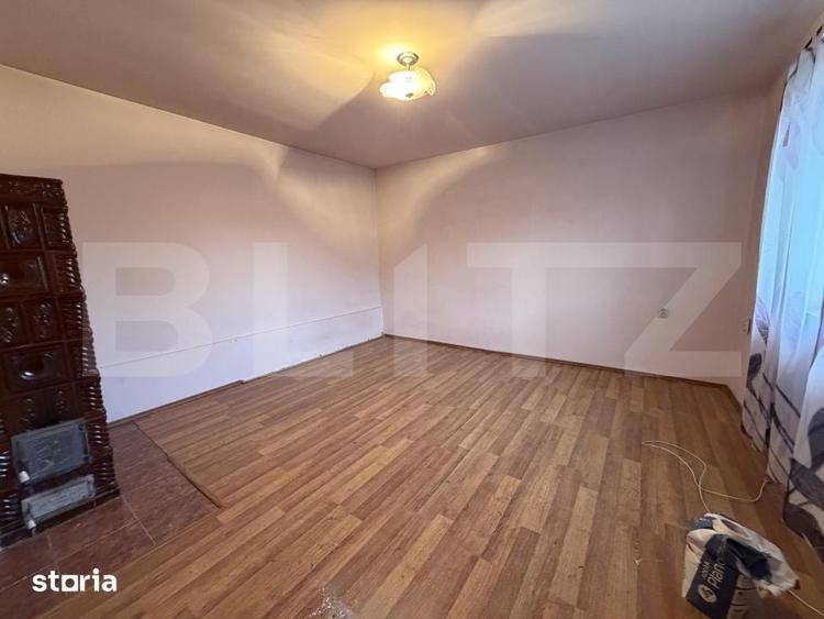 Casă cu 4 camere cu Teren 1000 Mp în Lozna