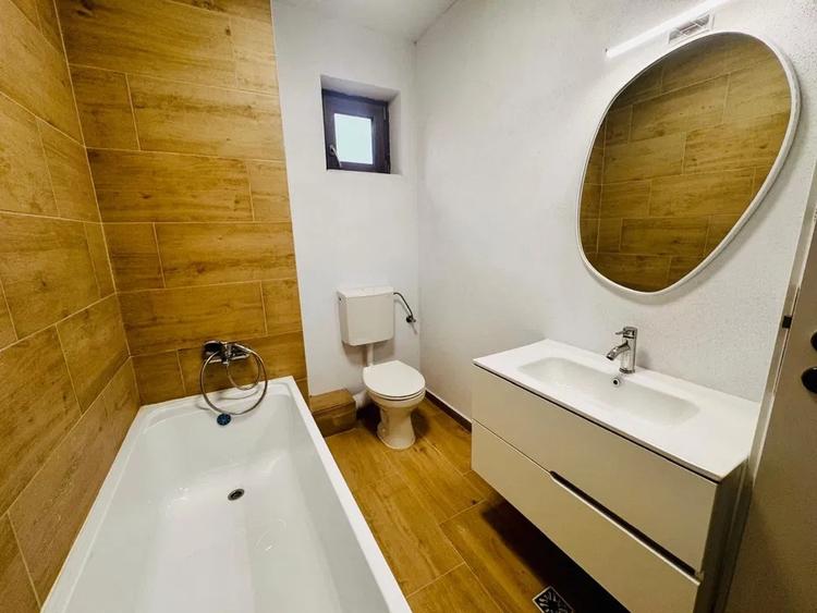 Apartament cu 3 camere semidecomandat, mobilat în Borhanci