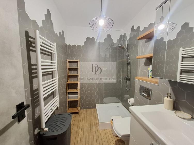 Apartament cu 2 camere semidecomandat, mobilat în Borhanci