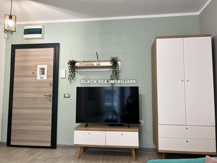 Apartament cu 2 camere, mobilat în Central