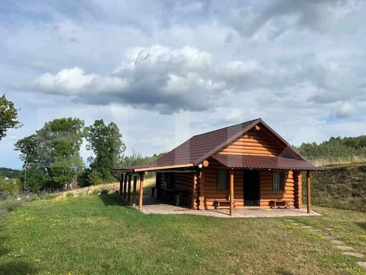 Cabana din bu?teni - refugiu ideal in mijlocul naturii - 1