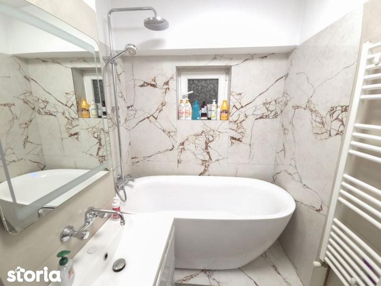 Apartament cu 3 camere decomandat în Calea București