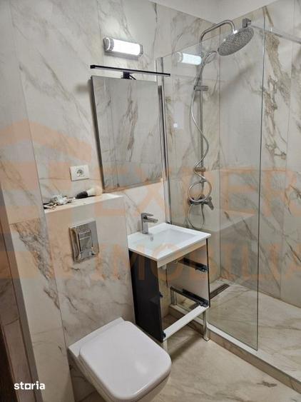 Apartament cu 2 camere semidecomandat, mobilat în City Park Mall