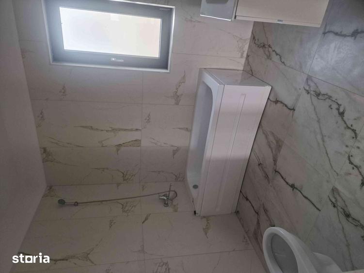 Casă cu 4 camere cu Teren 500 Mp în Central