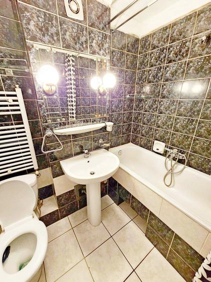 Apartament cu 4 camere semidecomandat în Dorobanților
