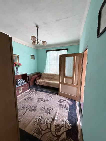 Casă cu 2 camere cu Teren 1200 Mp în Central