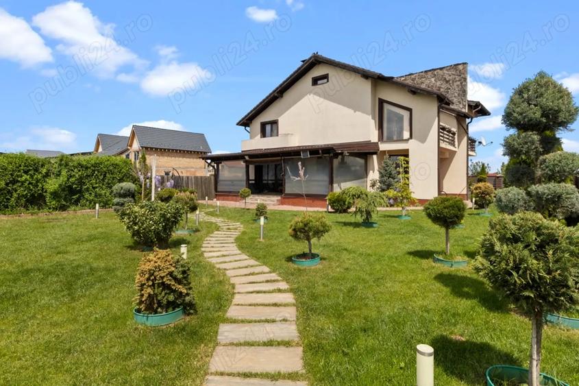Casă cu 5 camere cu Teren 1650 Mp în Sânpetru