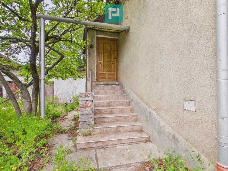 Casă cu 4 camere cu Teren 405 Mp în Romanilor