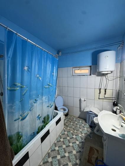 Casă individuală cu 3 camere cu Canalizare în Est